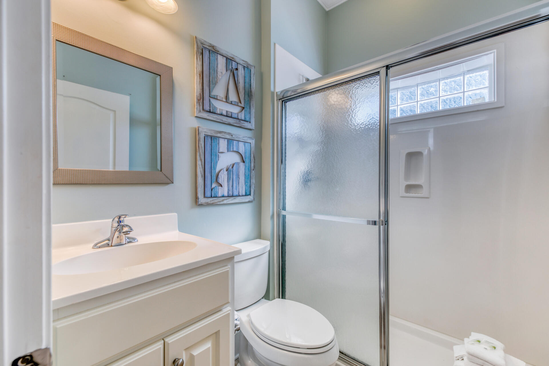 28 Sandcastle Court Santa Rosa Beach, FL 32459 - Photo 28 of 78 a bathroom with a sink a mirror and a toilet