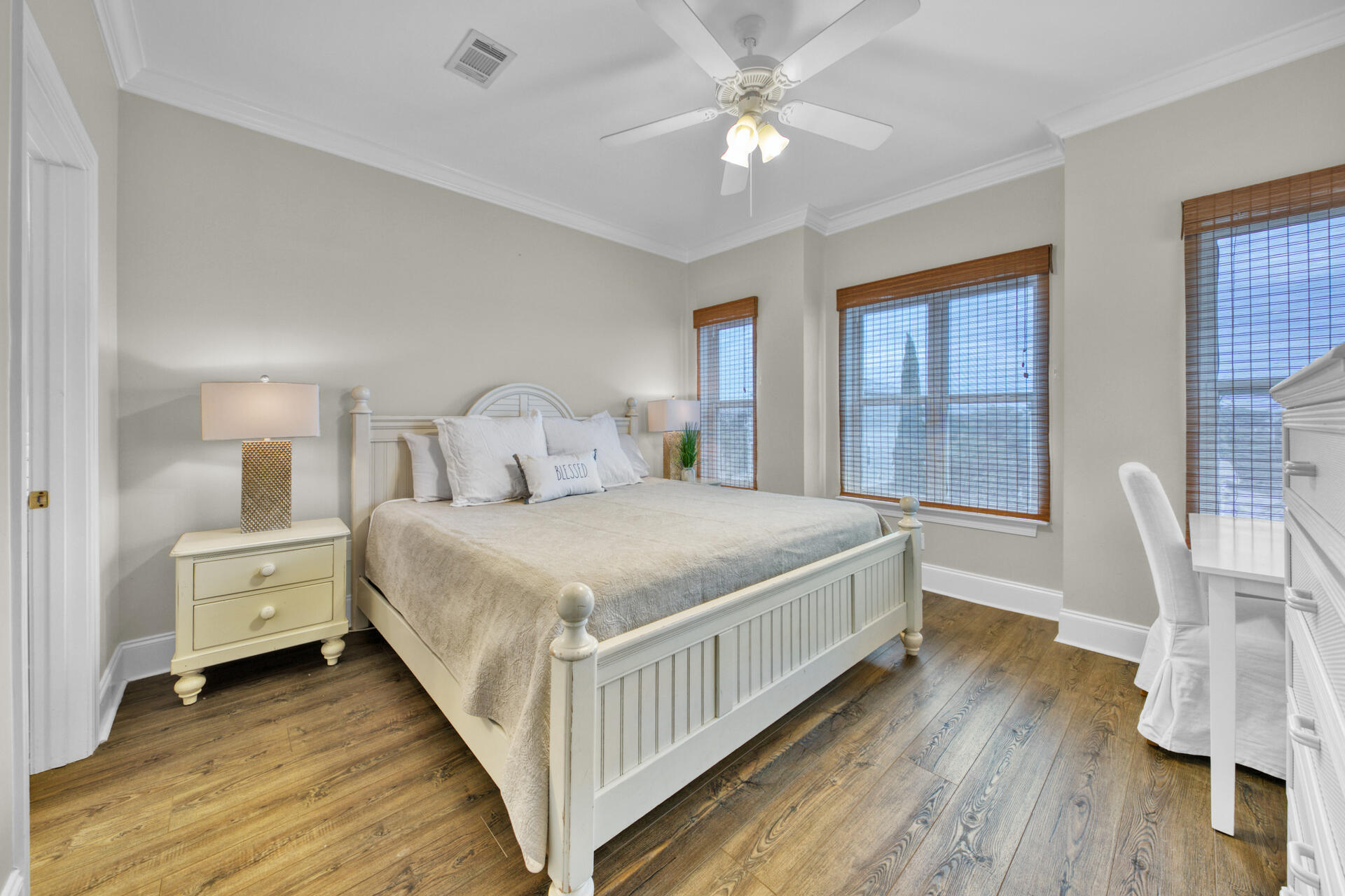 28 Sandcastle Court Santa Rosa Beach, FL 32459 - Photo 35 of 78 a bedroom with a bed and wooden floor