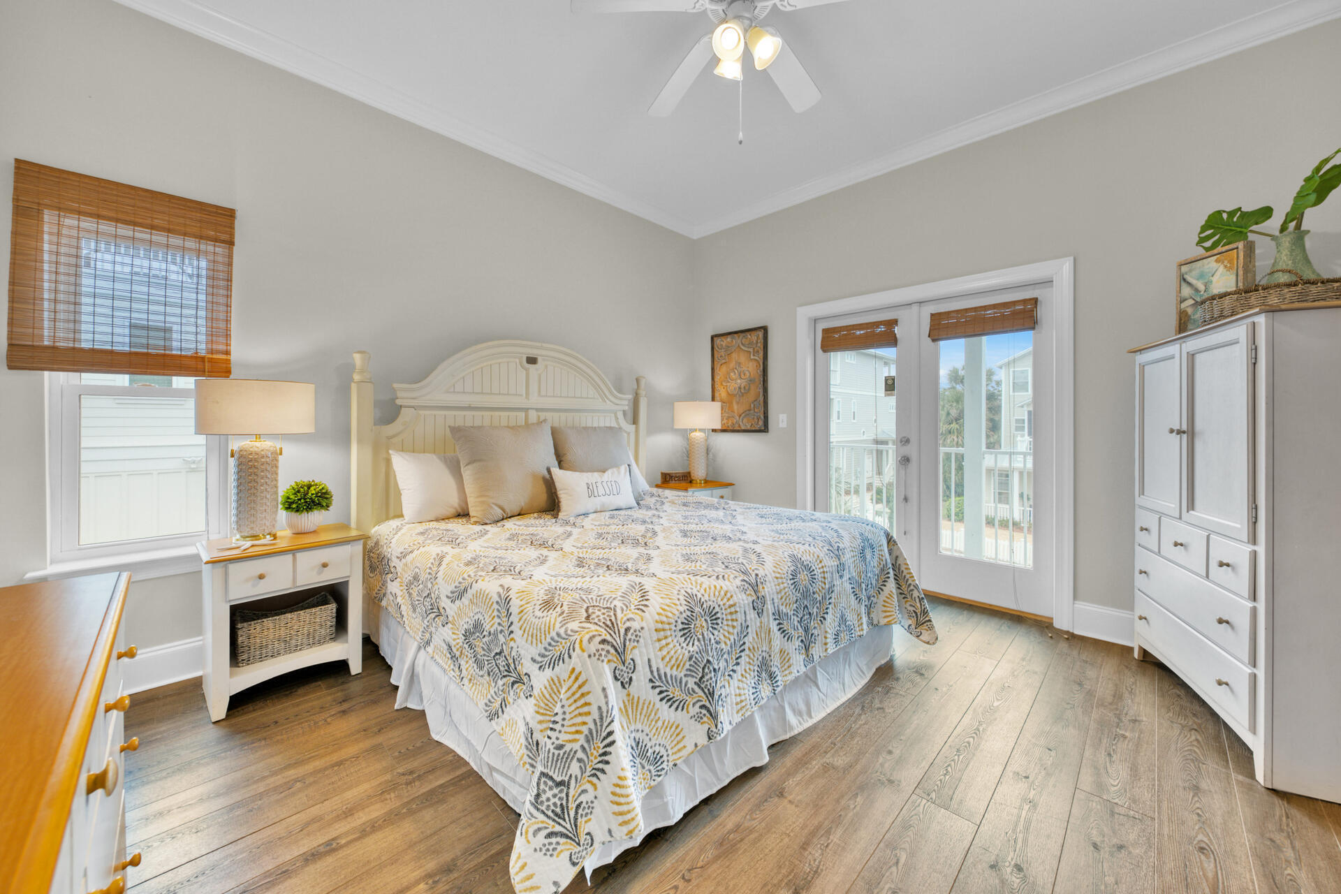 28 Sandcastle Court Santa Rosa Beach, FL 32459 - Photo 38 of 78 a bedroom with a large bed and a chandelier