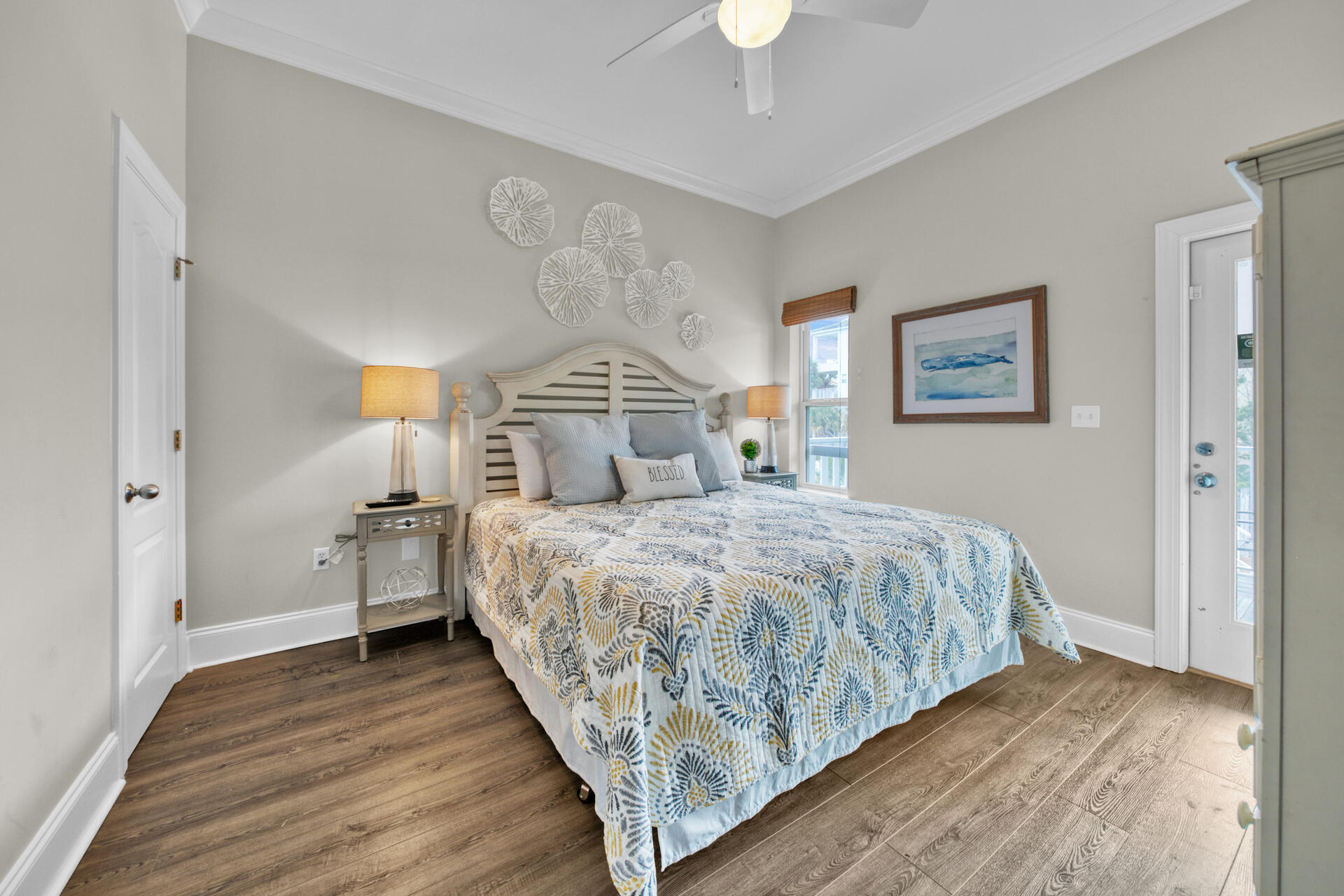 28 Sandcastle Court Santa Rosa Beach, FL 32459 - Photo 41 of 78 a bedroom with a large bed and a chandelier