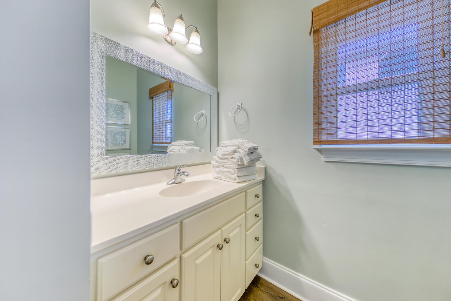 28 Sandcastle Court Santa Rosa Beach, FL 32459 - Photo 56 of 78 a bathroom with a sink and a mirror
