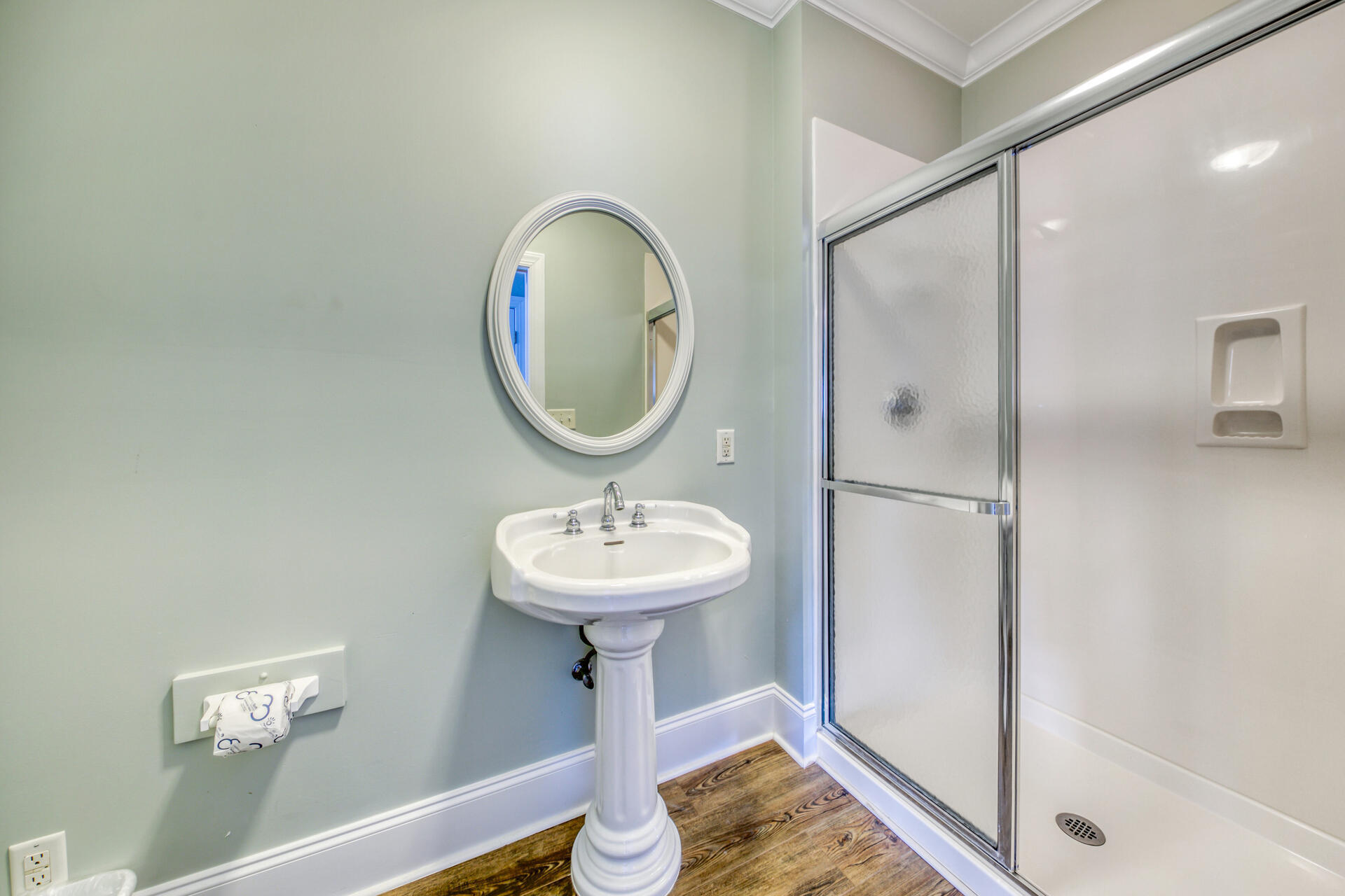 28 Sandcastle Court Santa Rosa Beach, FL 32459 - Photo 57 of 78 a bathroom with a sink a mirror and shower