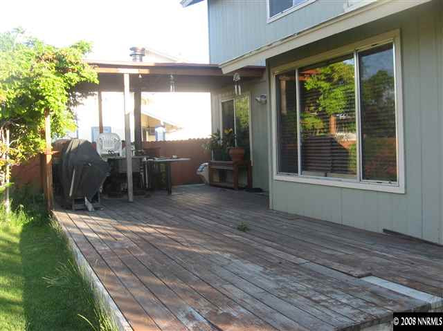 1140 Big Springs Road Reno, NV 89523 - Photo 6 of 9 a view of outdoor space yard deck patio and outdoor kitchen