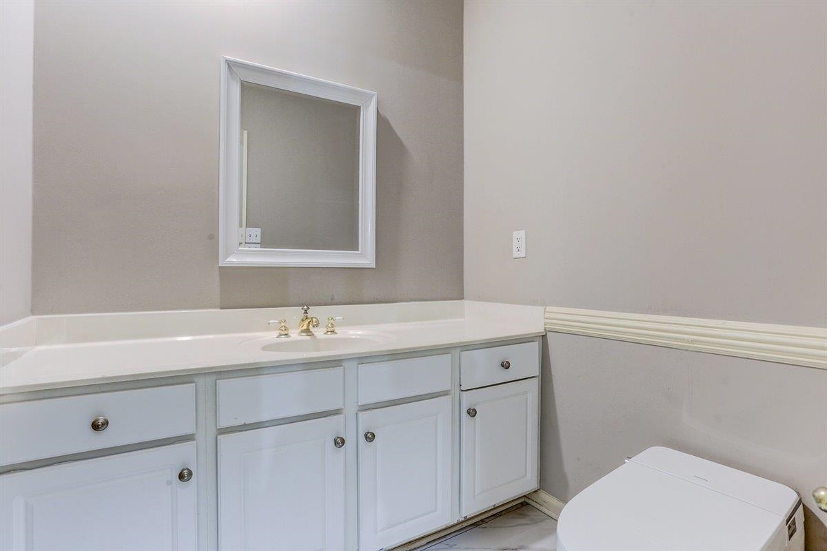 608 Roxburgh Drive Collierville, TN 38017 - Photo 27 of 40 Half bath featuring vanity and light marble finish flooring