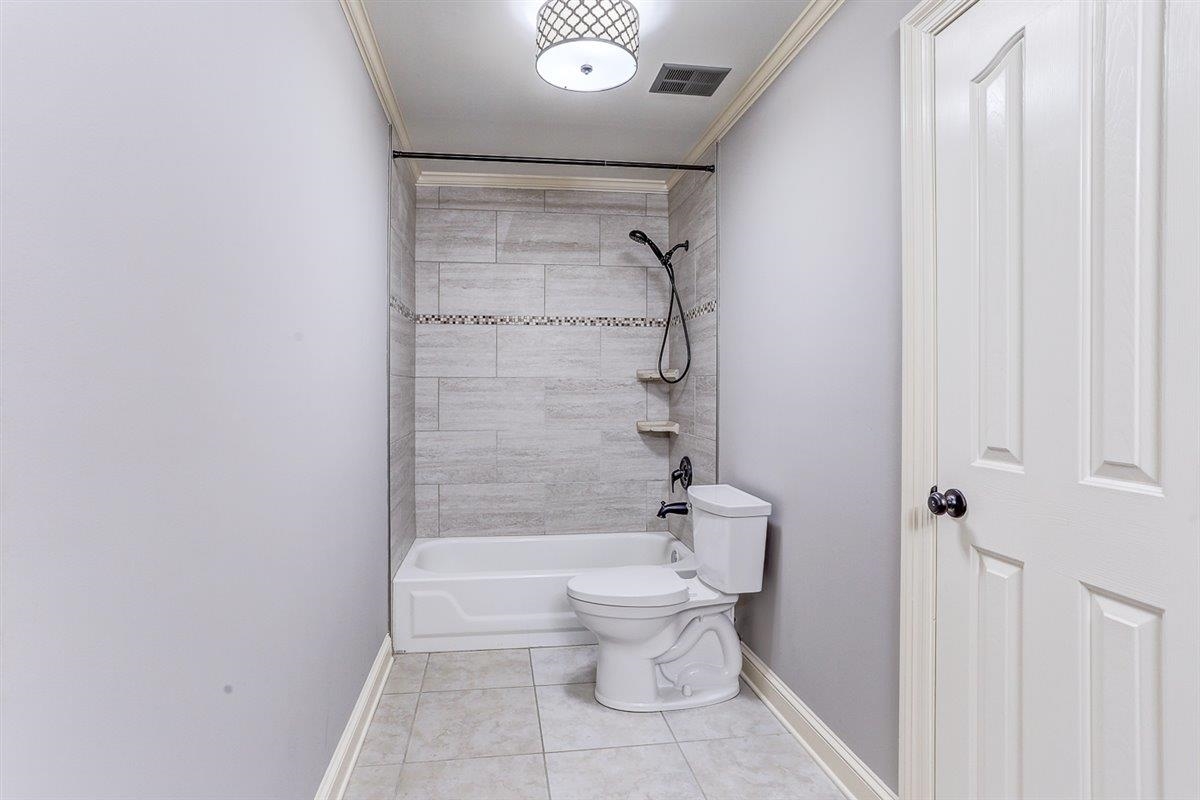 608 Roxburgh Drive Collierville, TN 38017 - Photo 31 of 40 Bathroom featuring light tile patterned floors and shower / bath combination