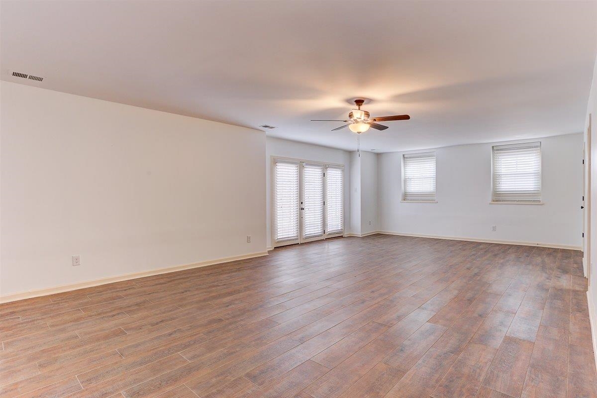 608 Roxburgh Drive Collierville, TN 38017 - Photo 35 of 40 Unfurnished room featuring light wood-type flooring and ceiling fan