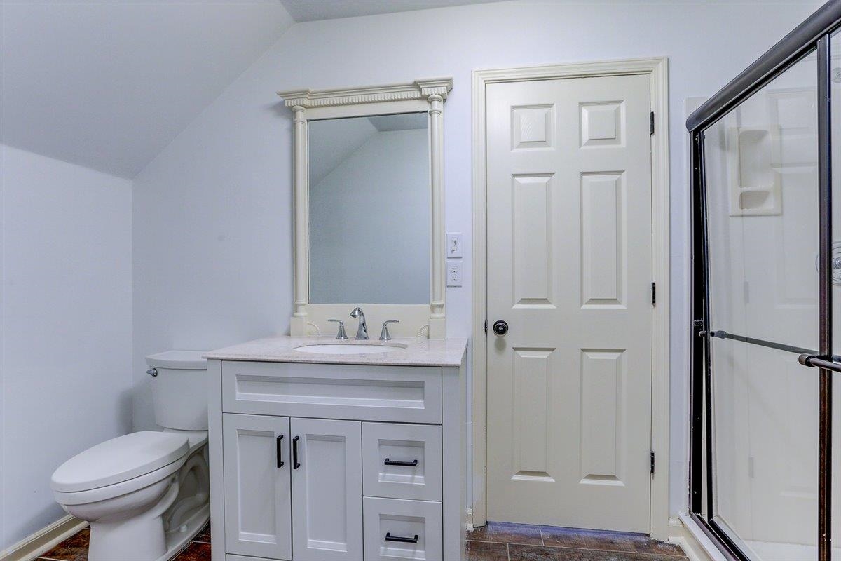 608 Roxburgh Drive Collierville, TN 38017 - Photo 36 of 40 Bathroom with lofted ceiling, vanity, and a shower stall