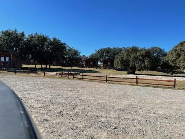 a view of a swimming pool with an outdoor seating