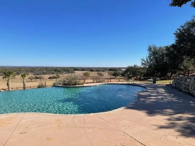 a view of balcony with furniture
