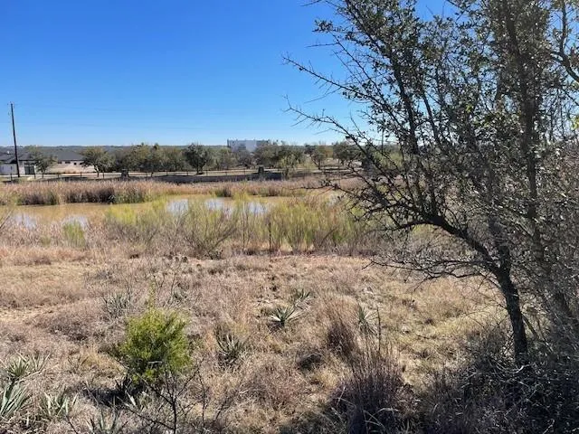 a view of a lake with houses