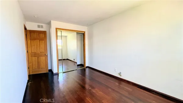 a view of a balcony with chairs