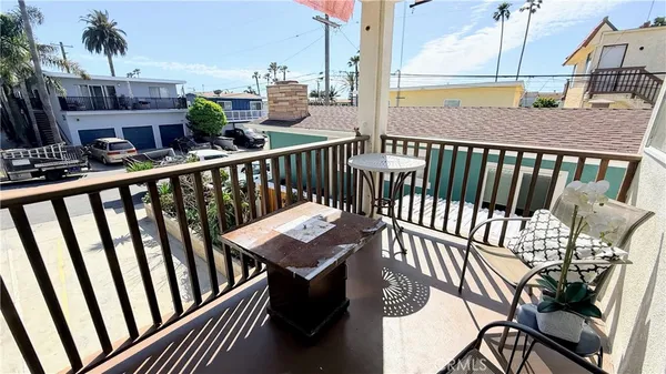 a view of a balcony with chair