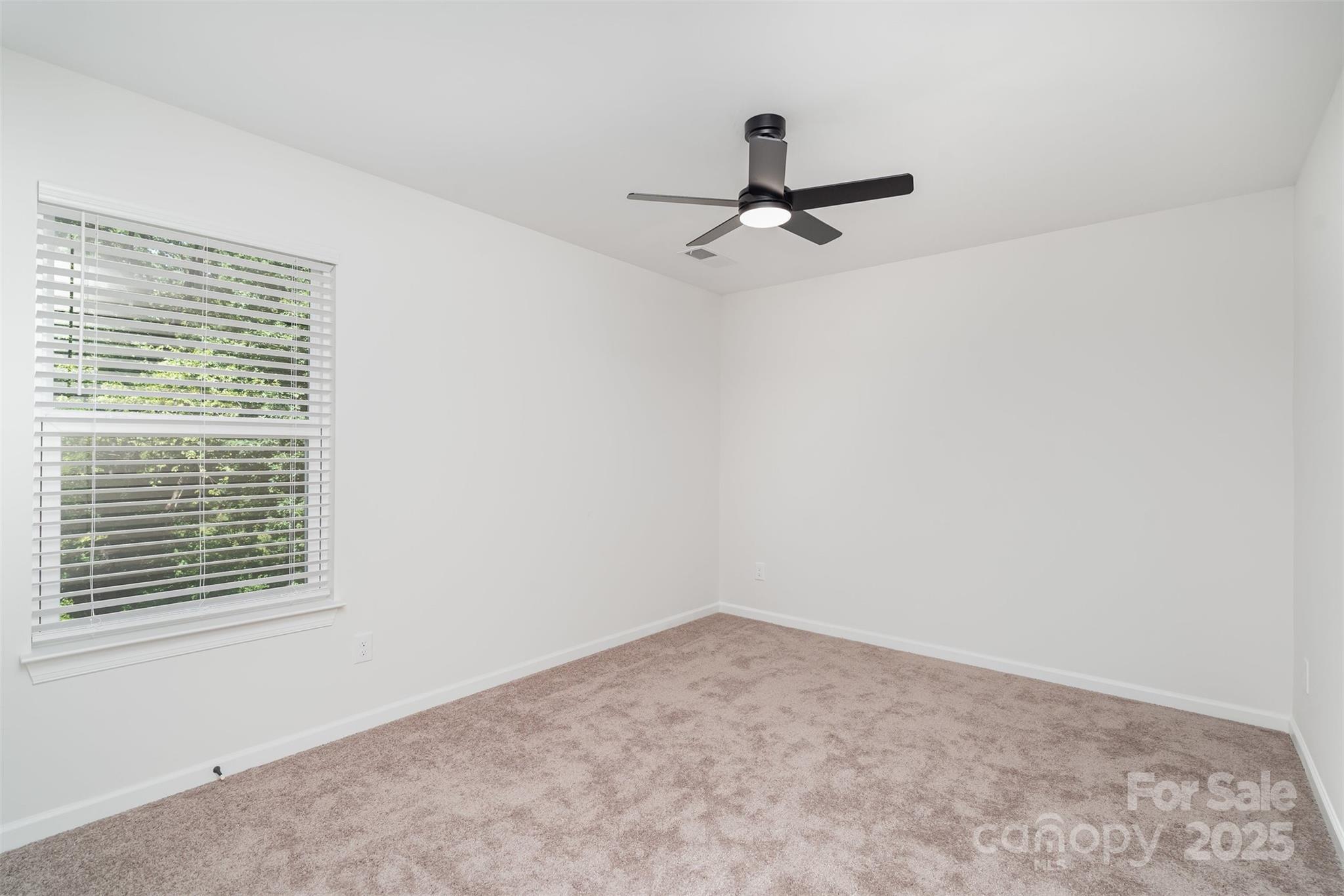 1563 Riverview Circle Fort Lawn, SC 29714 - Photo 16 of 27 a view of a room with a window and a ceiling fan