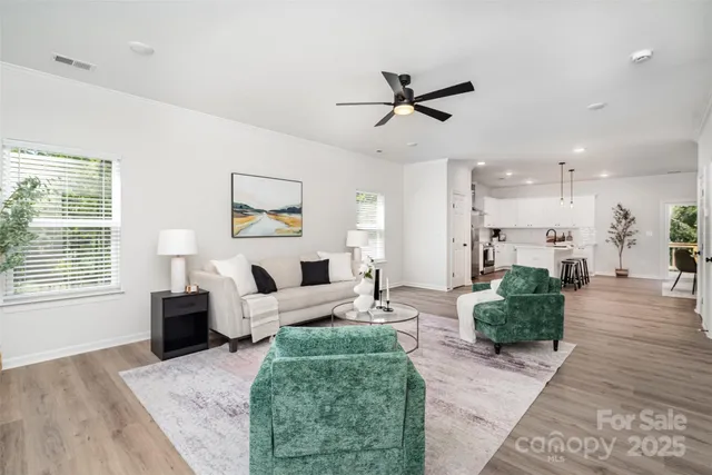 a living room with furniture and a window