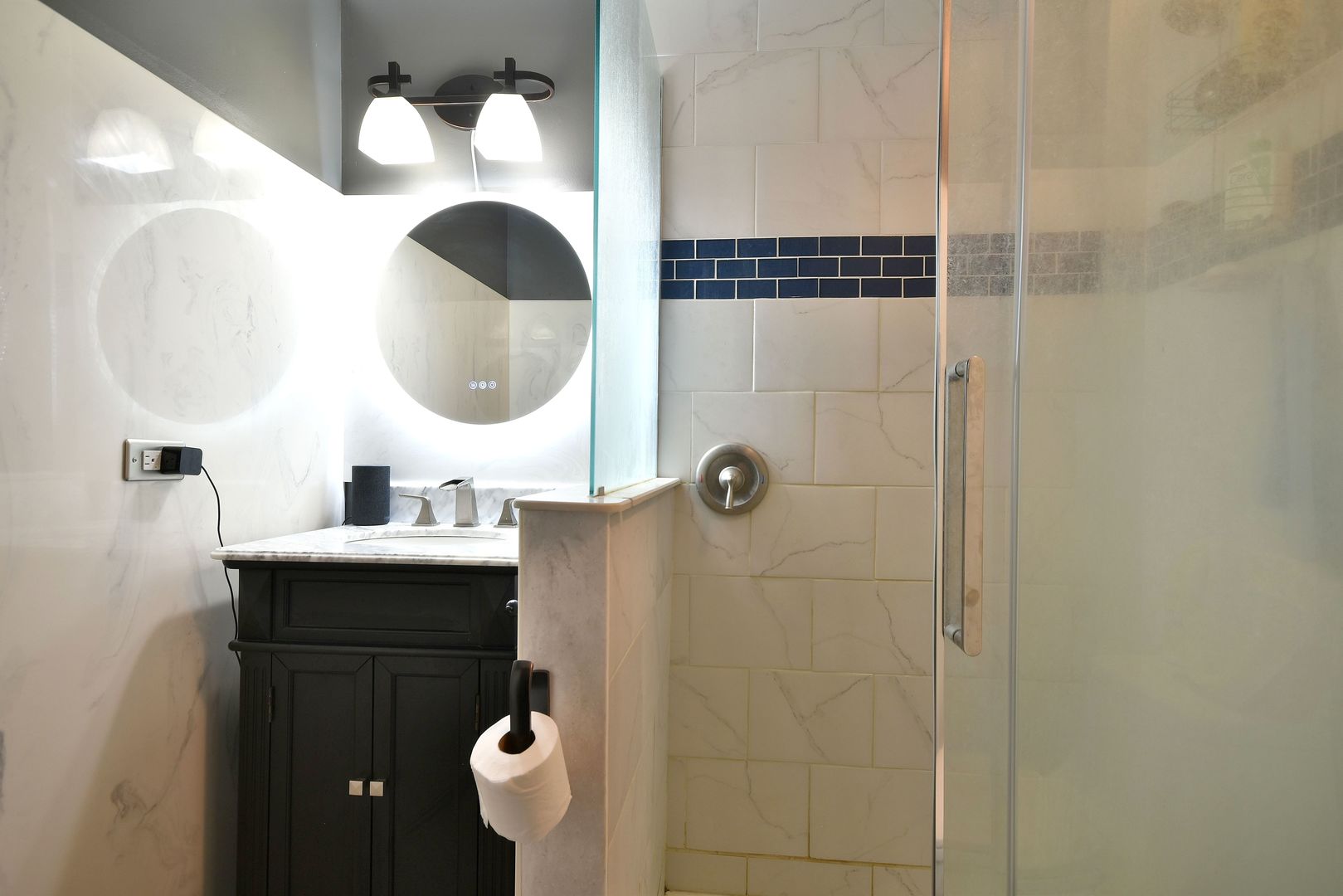 9N590 Flora Drive Elgin, IL 60123 - Photo 19 of 31 a bathroom with a sink mirror and vanity