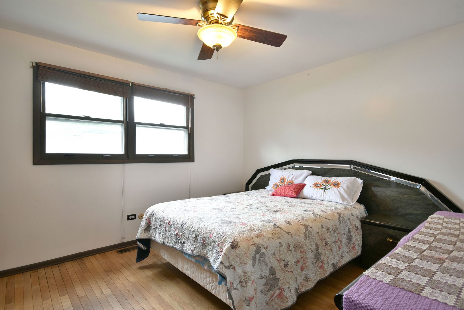 9N590 Flora Drive Elgin, IL 60123 - Photo 23 of 31 a bedroom with a bed and window