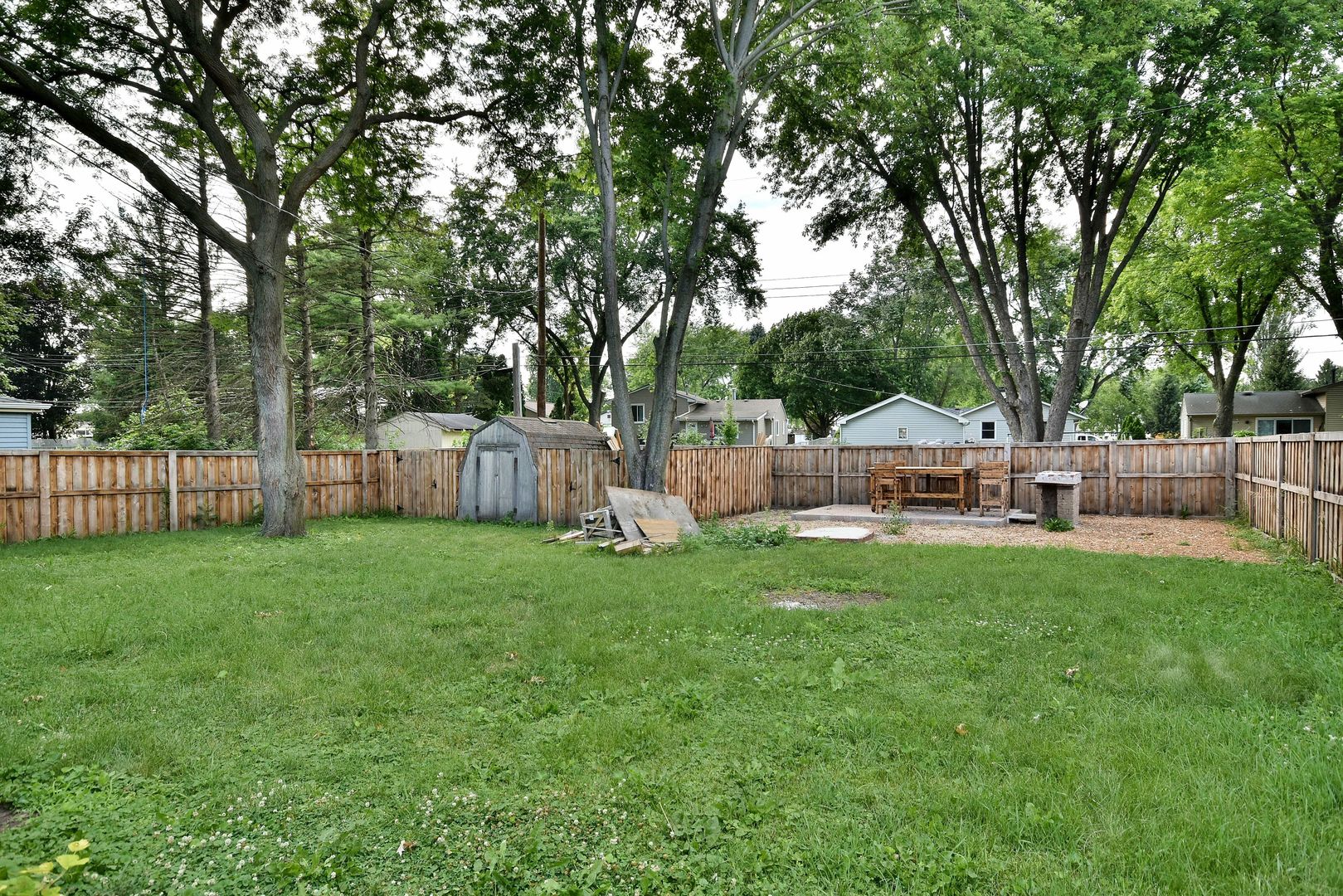 9N590 Flora Drive Elgin, IL 60123 - Photo 28 of 31 a view of a garden with a slide