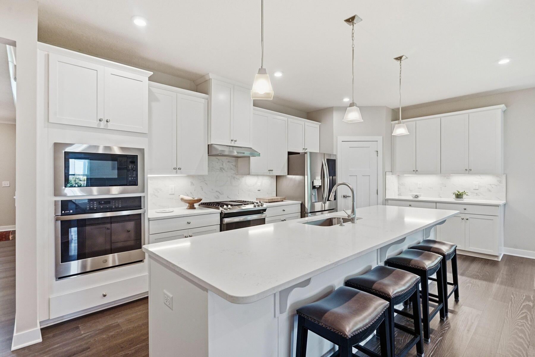 119 Firenze Road Delaware, OH 43015 - Photo 13 of 56 Kitchen w/Breakfast Bar