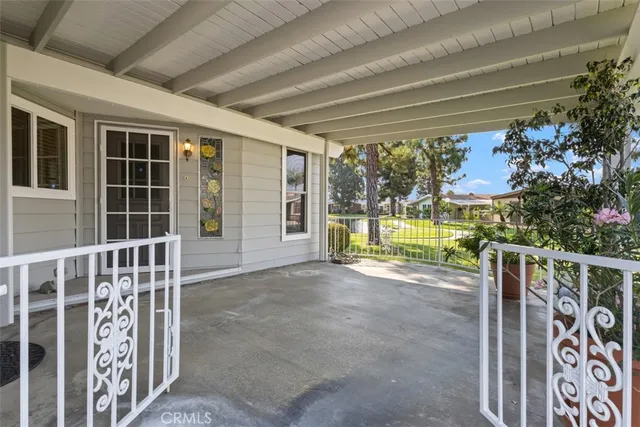 a view of a porch with garden