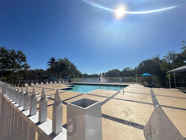 a view of swimming pool with lake view