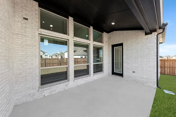 a view of an empty room with closet
