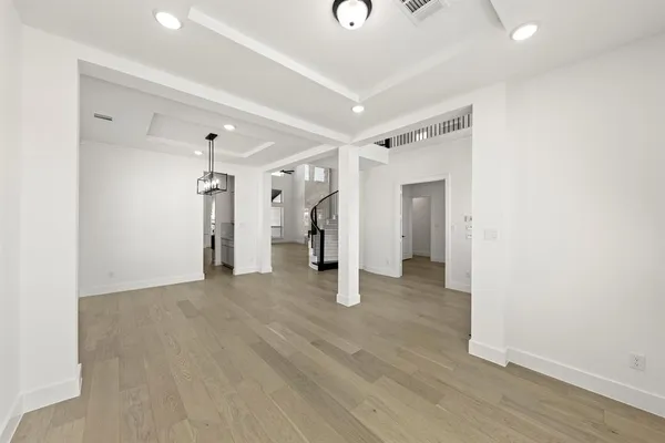 a view of a livingroom with wooden floor