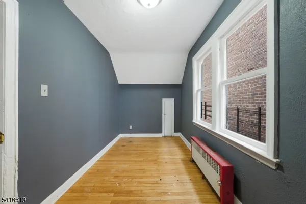 a view of a room with windows