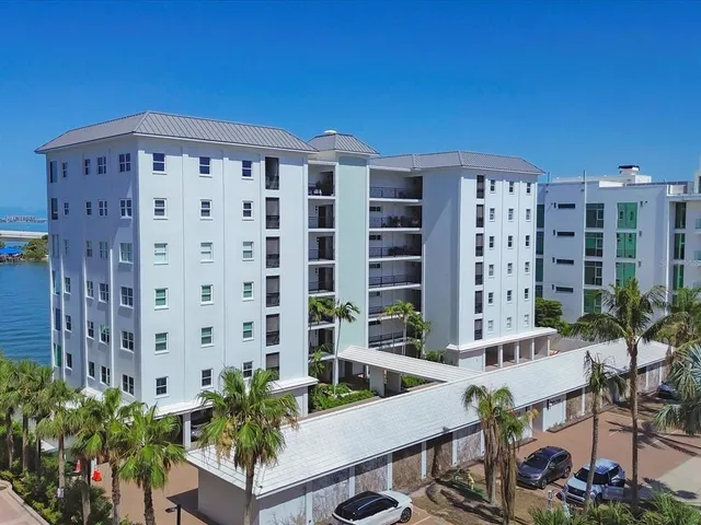 a view of a tall building in front of house