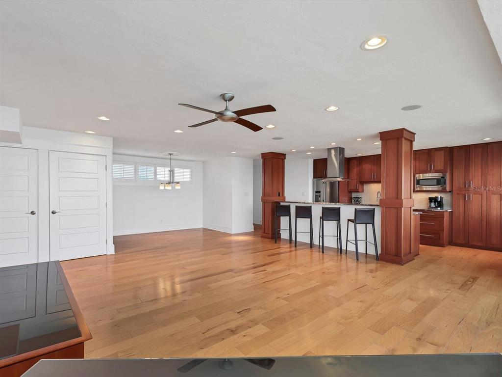 226 Golden Gate Point, Unit 63 Sarasota, FL 34236 - Photo 14 of 48 a view of kitchen with furniture and window