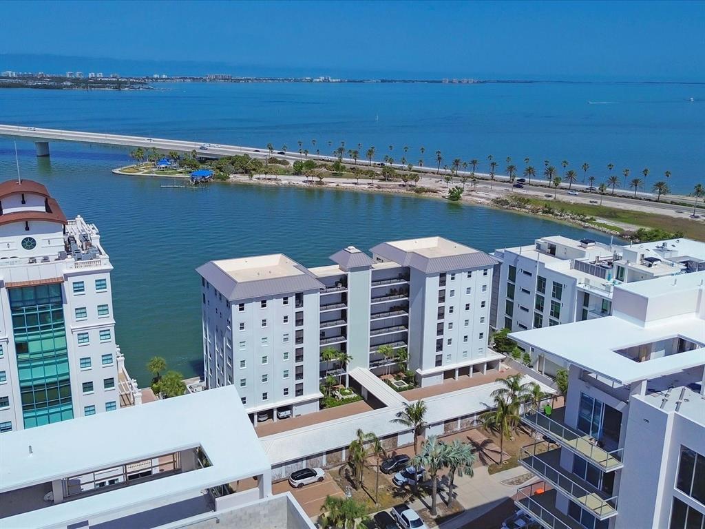226 Golden Gate Point, Unit 63 Sarasota, FL 34236 - Photo 3 of 48 a view of a city with tall buildings