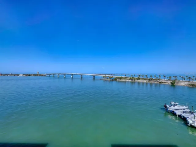 a view of a lake with houses in outdoor space