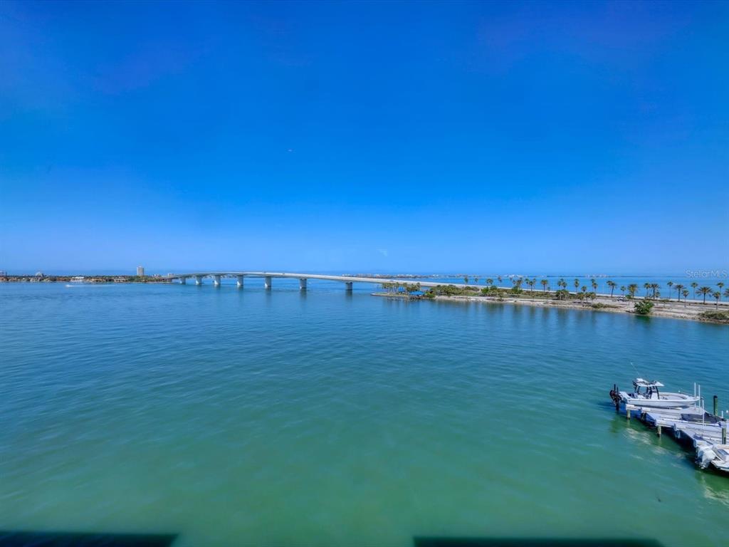 226 Golden Gate Point, Unit 63 Sarasota, FL 34236 - Photo 39 of 48 a view of a lake with houses in outdoor space