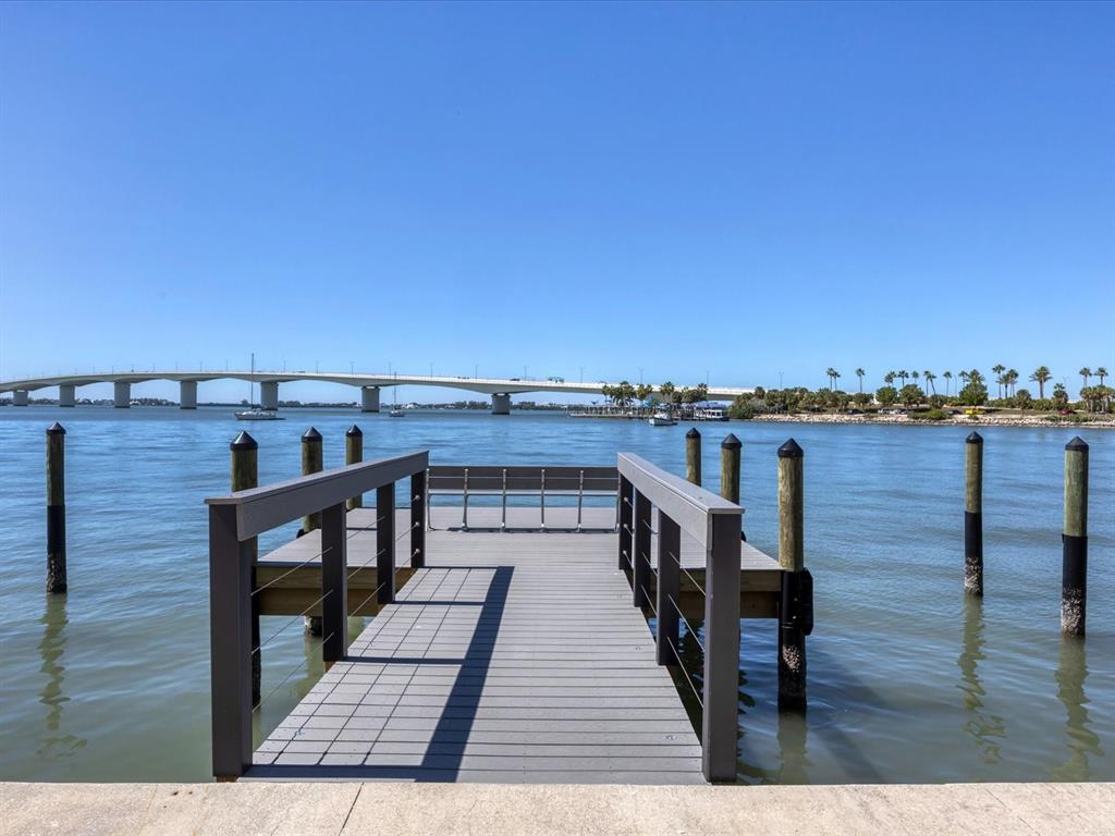 226 Golden Gate Point, Unit 63 Sarasota, FL 34236 - Photo 42 of 48 a view of a balcony with wooden floor and city view