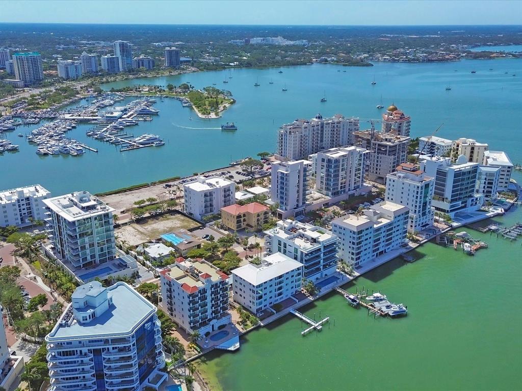 226 Golden Gate Point, Unit 63 Sarasota, FL 34236 - Photo 46 of 48 an aerial view of a house with a lake view
