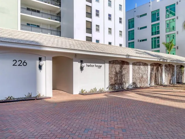 a front view of building with a entrance