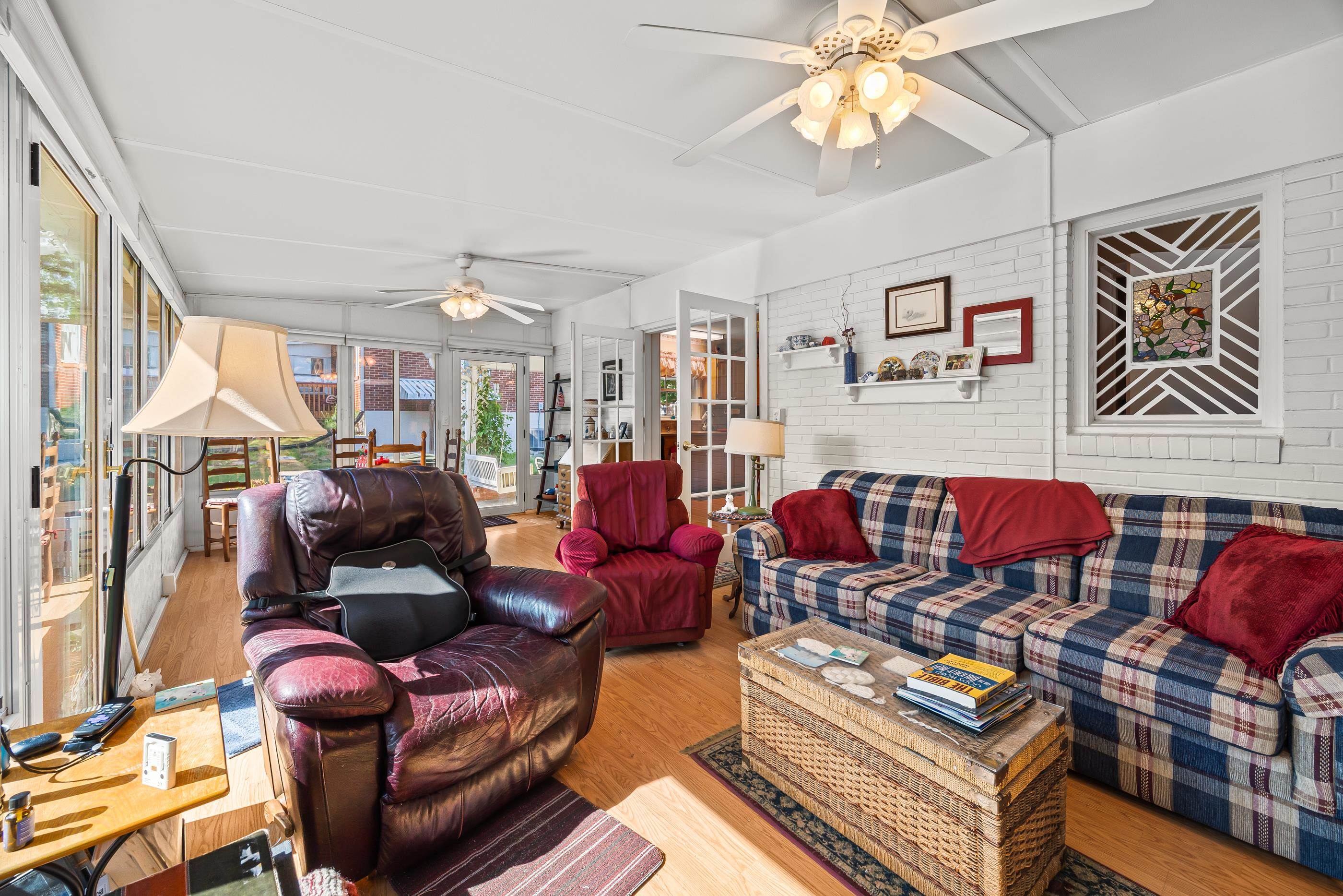 208 Tuxedo Road Staunton, VA 24401 - Photo 22 of 46 a living room filled with furniture and a chandelier