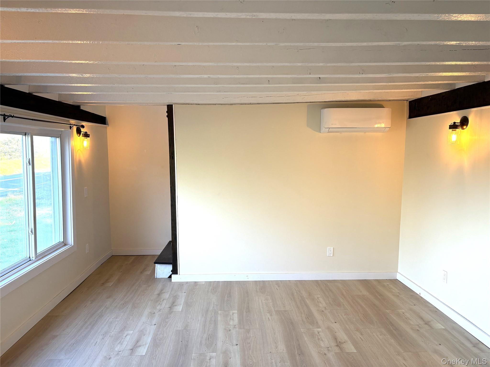 351 Co Rte 19 Hudson, NY 12534 - Photo 13 of 26 a view of empty room with wooden floor and fan