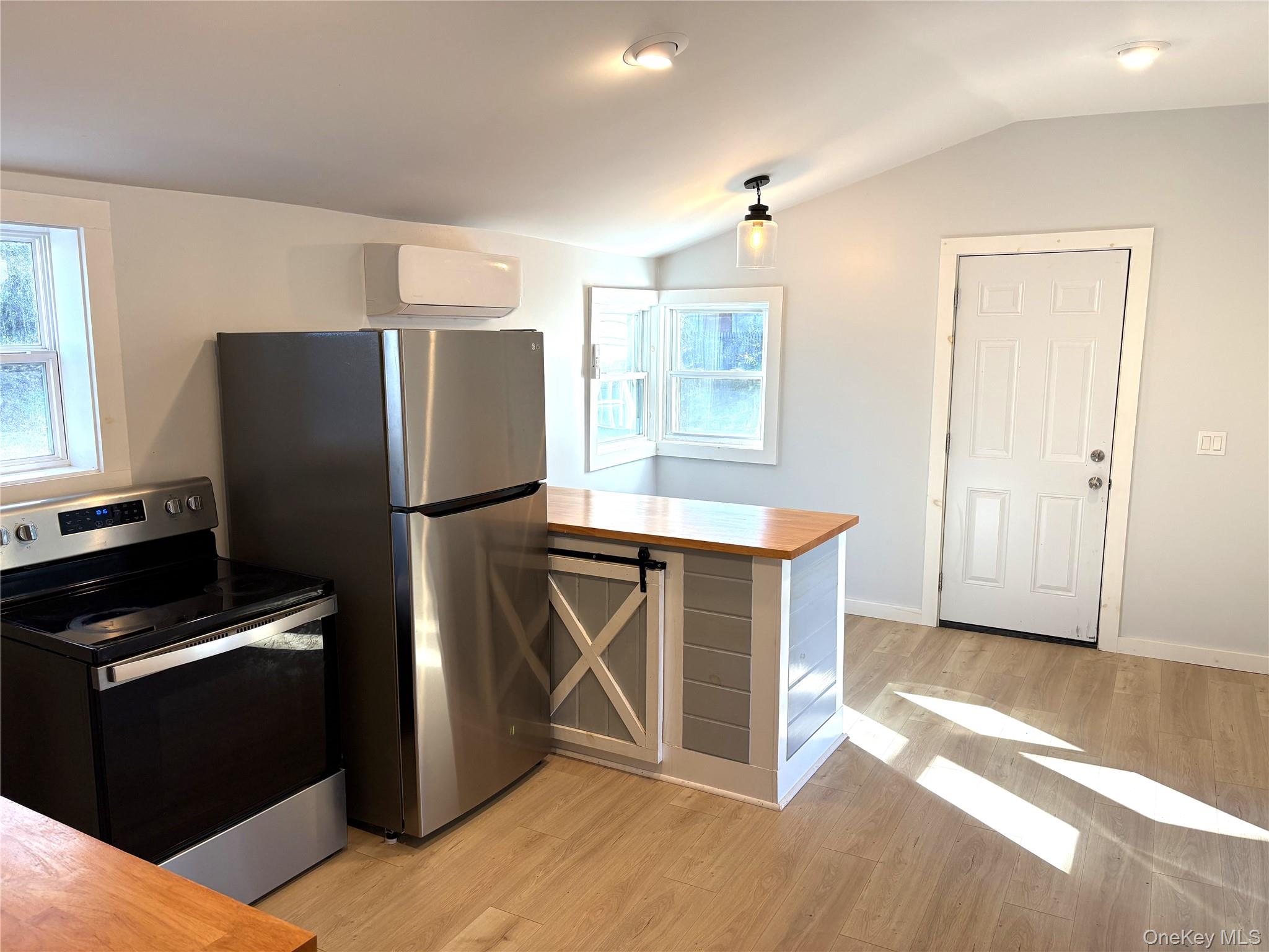 351 Co Rte 19 Hudson, NY 12534 - Photo 10 of 26 a kitchen with stainless steel appliances granite countertop a refrigerator a stove and a sink
