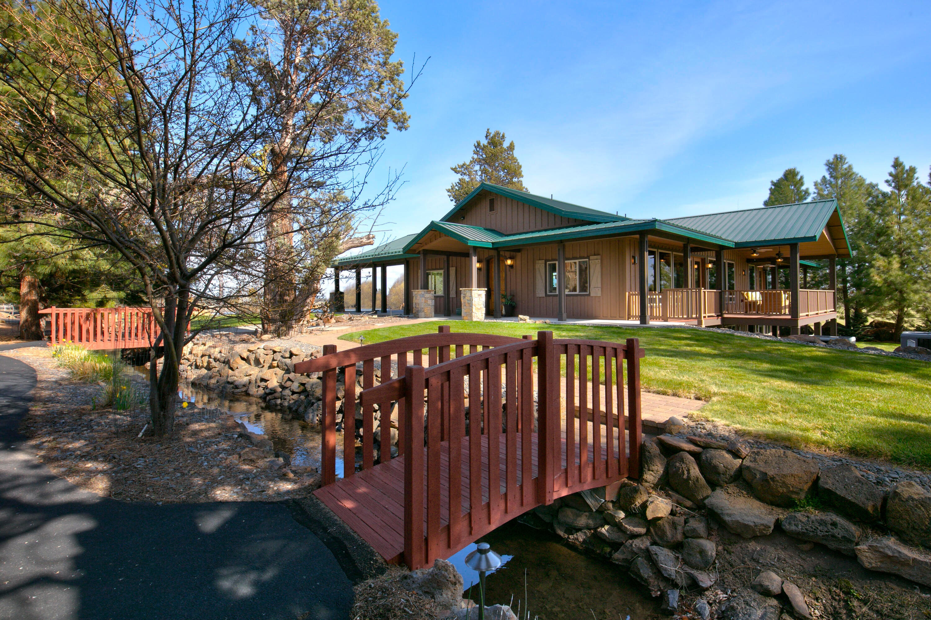 69015 Hurtley Ranch Road Sisters, OR 97759 - Photo 10 of 88 Pond and seasonal stream with 2 walking bridges