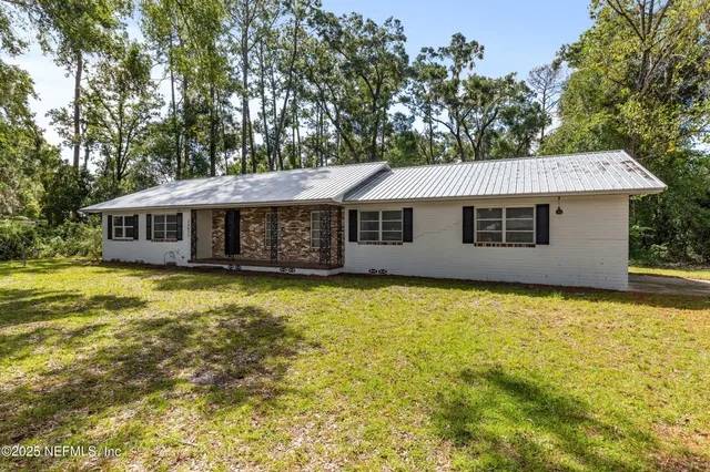 a front view of a house with swimming pool