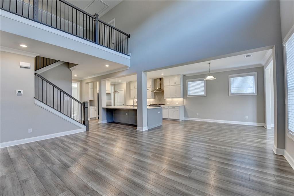 3445 Benedict Place Suwanee, GA 30024 - Photo 19 of 59 a view of an entryway with wooden floor