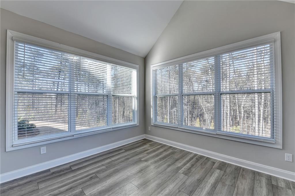 3445 Benedict Place Suwanee, GA 30024 - Photo 23 of 59 a view of an empty room with a window