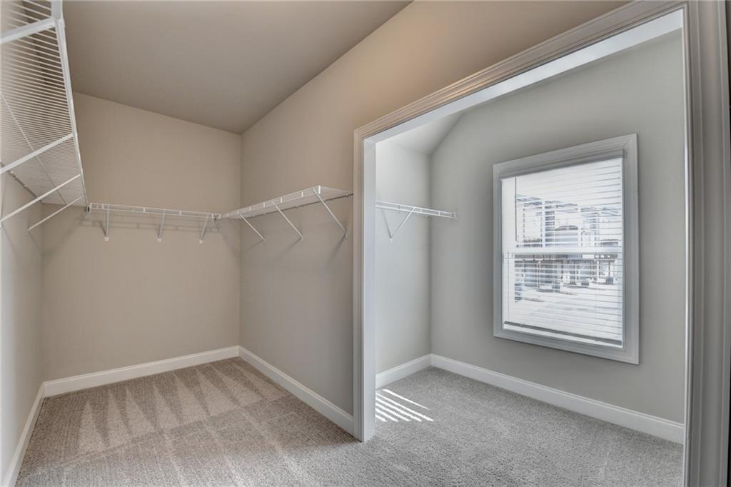 3445 Benedict Place Suwanee, GA 30024 - Photo 36 of 59 a view of an empty room with a window