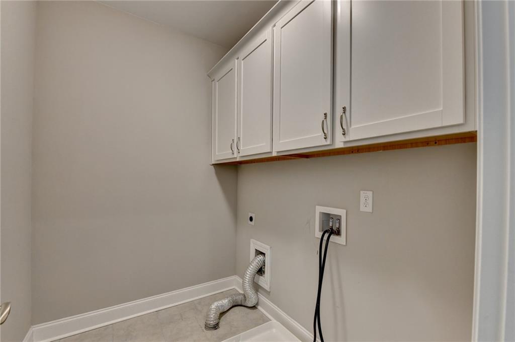 3445 Benedict Place Suwanee, GA 30024 - Photo 41 of 59 a bathroom with a sink