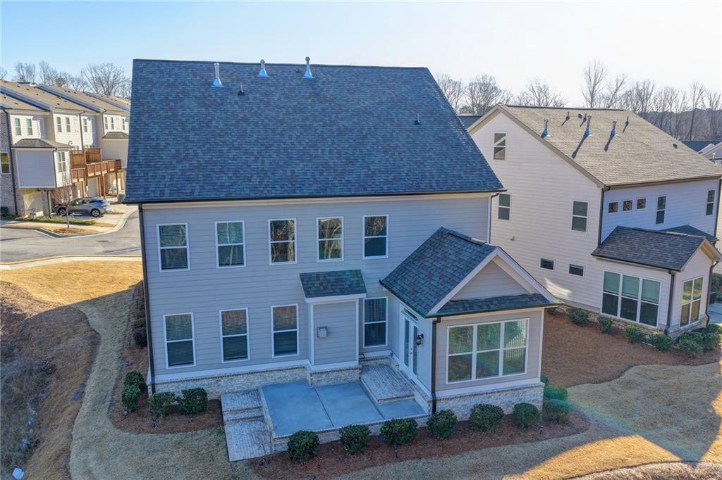 3445 Benedict Place Suwanee, GA 30024 - Photo 51 of 59 a aerial view of a house next to a big yard