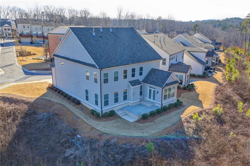 3445 Benedict Place Suwanee, GA 30024 - Photo 52 of 59 an aerial view of a house with a yard basket ball court and outdoor seating
