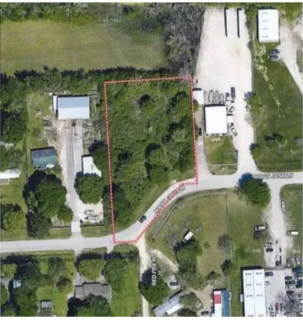 an aerial view of a residential houses with outdoor space and swimming pool