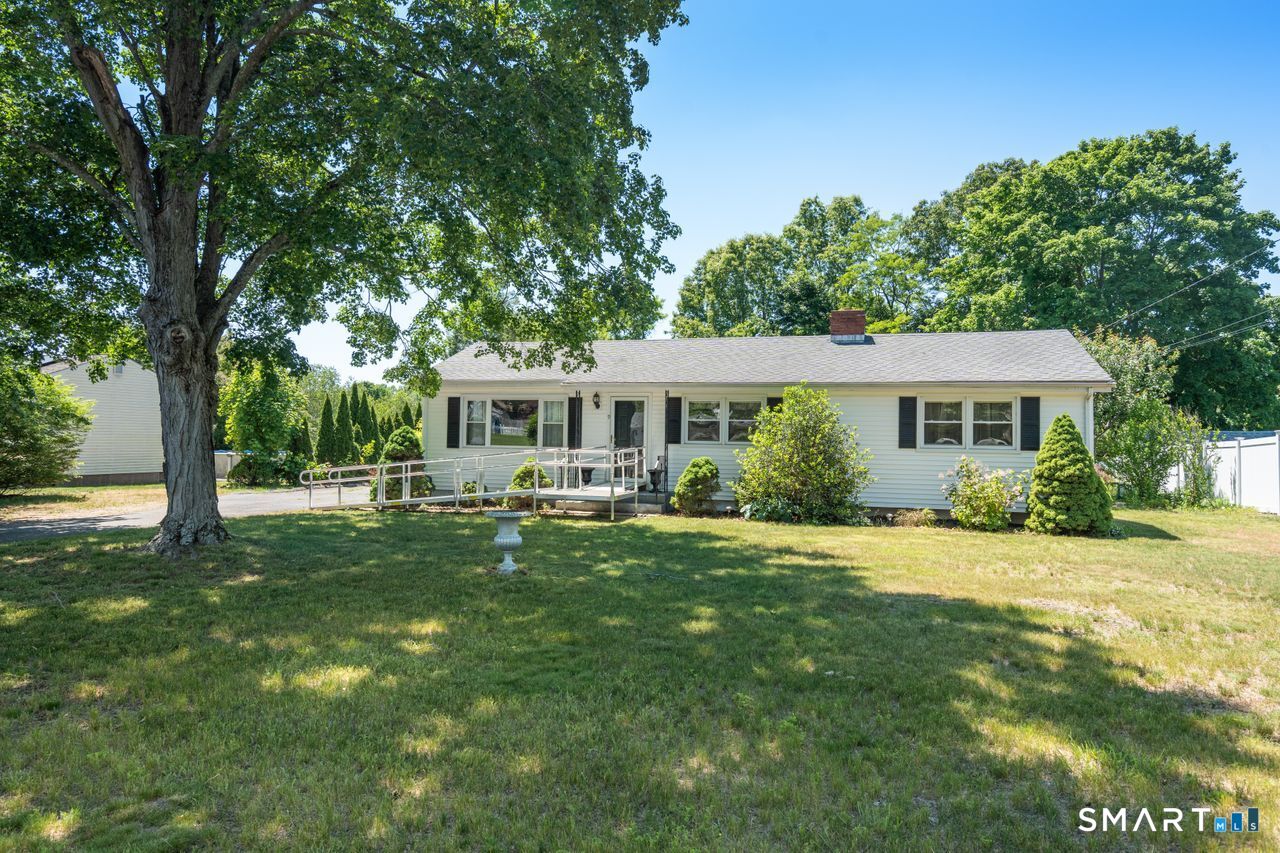 9 Stanton Road North Haven, CT 06473 - Photo 34 of 35 a front view of a house with a garden