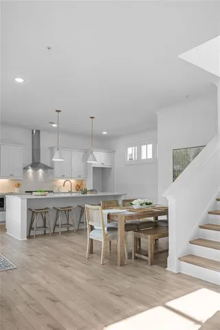 a living room with furniture a window and a fireplace