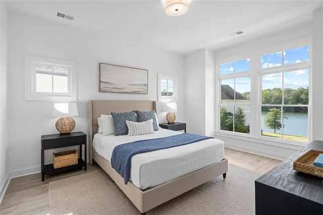a bathroom with a shower sink and mirror